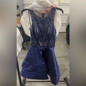 Elegant Blue Sleeveless Dress with Beaded Bodice